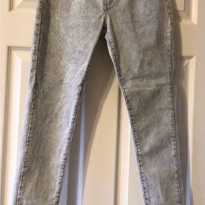 Levi Strauss & Company Super Skinny blue pinstripe woman’s jeans.